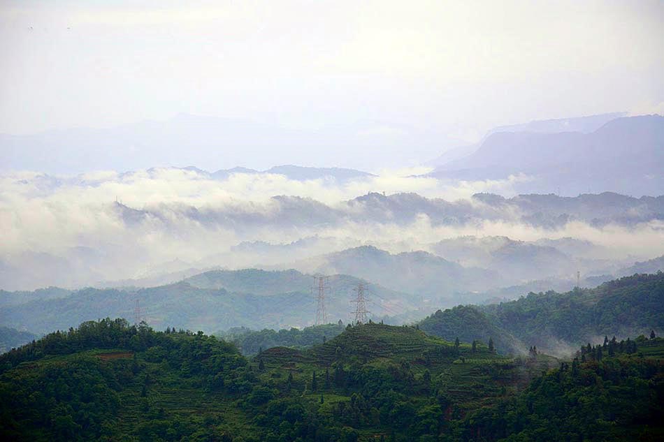 Mengding Mountain Shrouded In Clouds